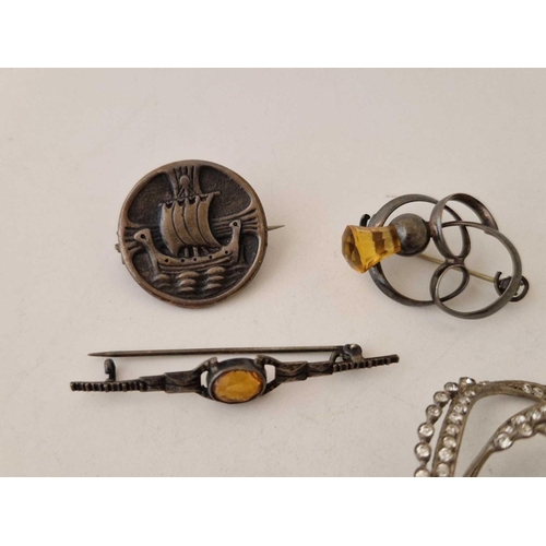 592 - A antique silver and paste brooch and three others