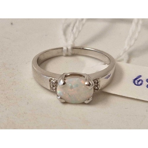 68 - A white gold opal ring 9ct size N 2.7 gms