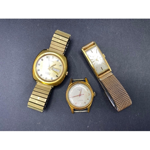 680 - A gents VOLVO wrist watch with seconds sweep and date aperture and two others