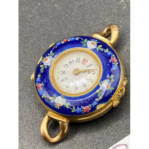 696 - A ladies enamel decorated wrist watch broken hinged 14ct gold