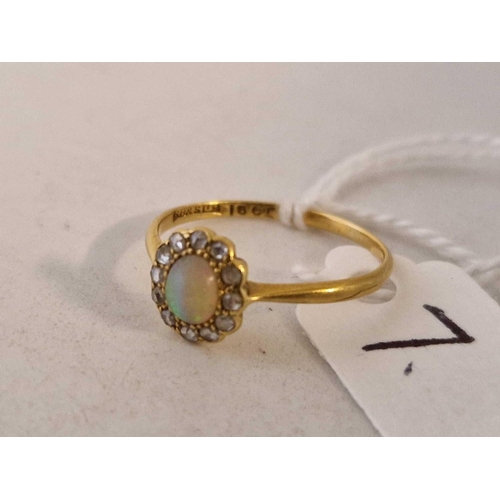 7 - A diamond and opal cluster 18ct gold size N 1.6 gms