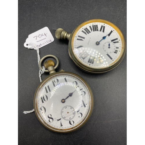 704 - A eight day pocket watch and gunmetal goliath watch with seconds dial