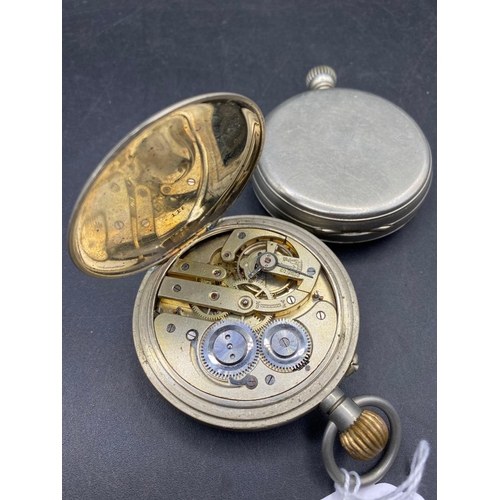 704 - A eight day pocket watch and gunmetal goliath watch with seconds dial