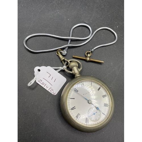 711 - A ELGIN pocket watch on metal albert with seconds dial