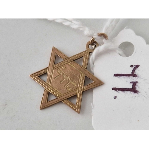 77 - A star of David charm 9ct