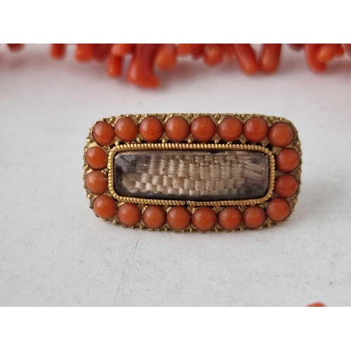 91 - A gold coral brooch and bracelet 8 inch