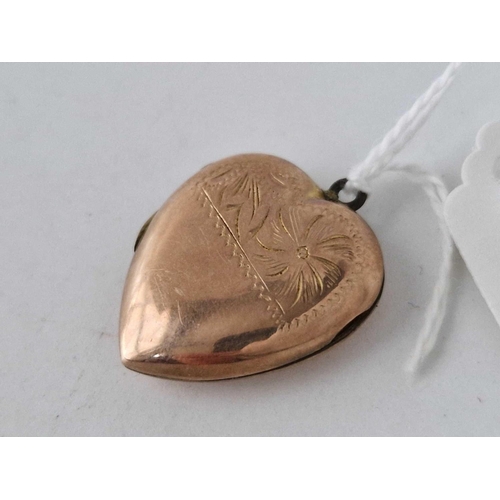 94 - A heart shaped back and front locket 3.6 gms