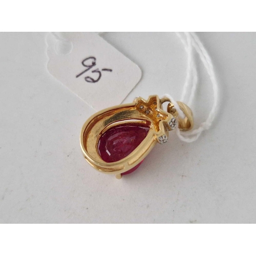 95 - A SYNTHETIC RUBY AND DIAMOND PENDANT 18CT GOLD 7.7 GMS