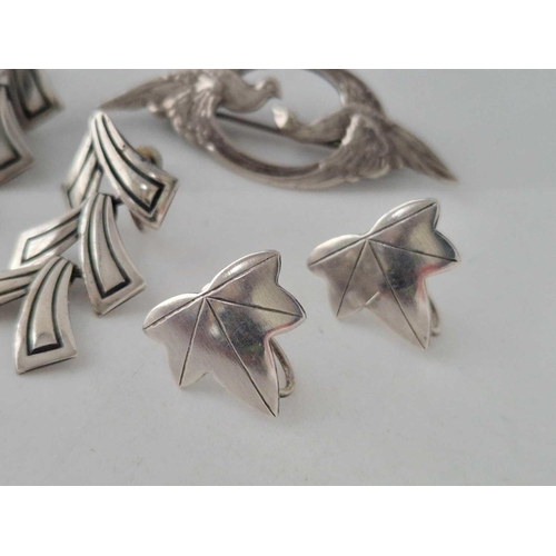 97 - Two pairs of silver earrings and brooch