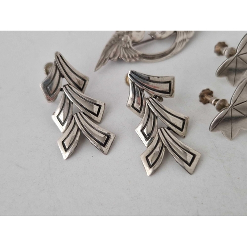 97 - Two pairs of silver earrings and brooch