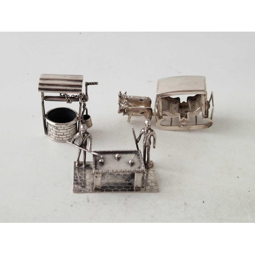 999b - A group of three miniature items, including well, bullock cart