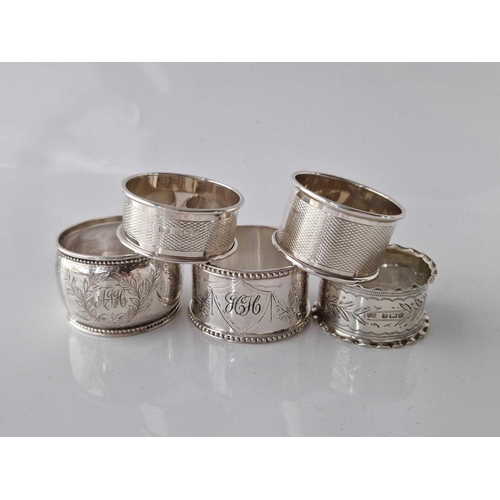 1013 - A group of five various napkin rings, Sheffield 1893 etc, 87g