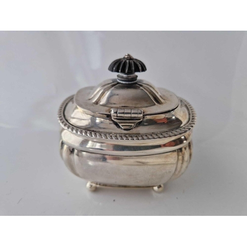 1019 - A tea caddy with crested Bombay shaped sides & wooden finial to hinged top, 4