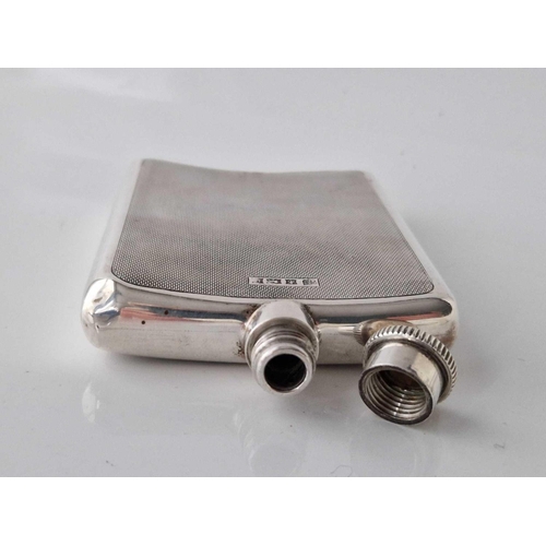 1024 - A good quality hip flask of curved outline, screw cover, 5