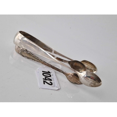 1042 - Two pairs of sugar tongs, one 1908.45gms