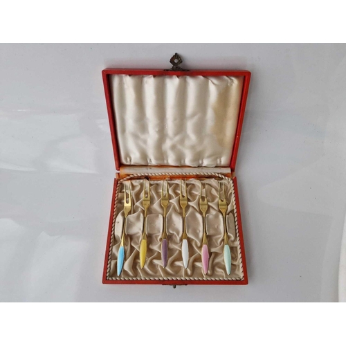 1072 - Set of six enamel decorated and gilt foreign cake forks