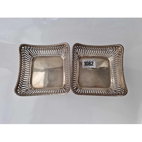 1082 - Pair of square sweet dishes with pierced sides 4.5 in wide. Birmingham 1912. 195gms