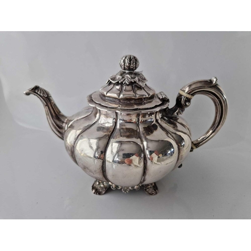 1083 - Large Early Victorian melon shaped teapot with ribbed sides 10.5 in wide. London 1858 By W H. 780gms