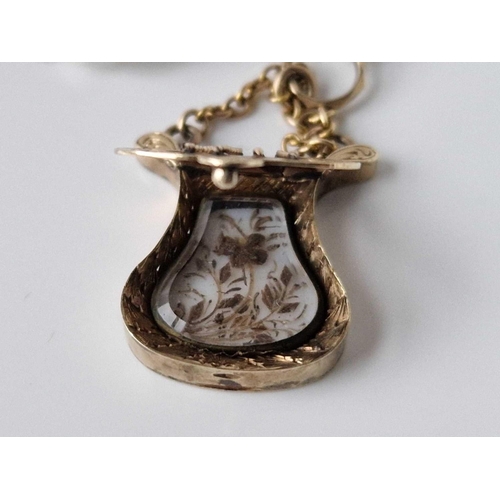 11 - A rare 19th century mourning musical pendant locket in gold