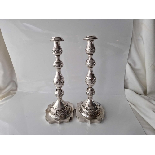 1113 - A Pair of Candle Sticks Embossed with Scrolls 12