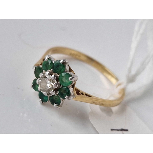 123 - A EMERALD AND DIAMOND RING 18CT GOLD SIZE V 3.8 GMS