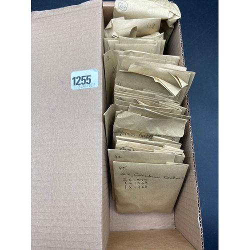 1255 - Box of world coins in envelopes