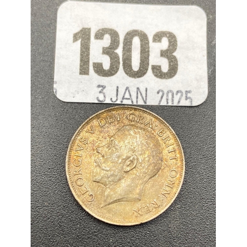 1303 - Shilling 1911 good grade toned