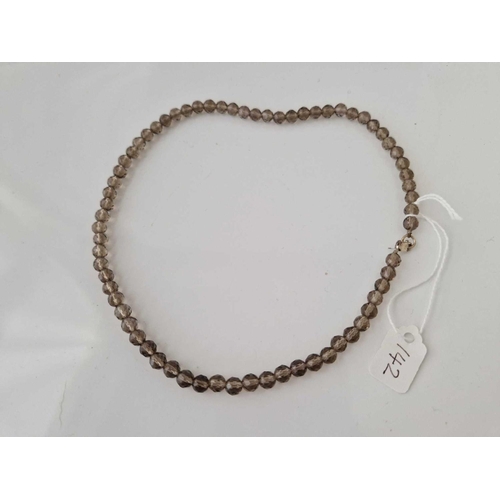 142 - A faceted smokey quartz necklace 16 inch