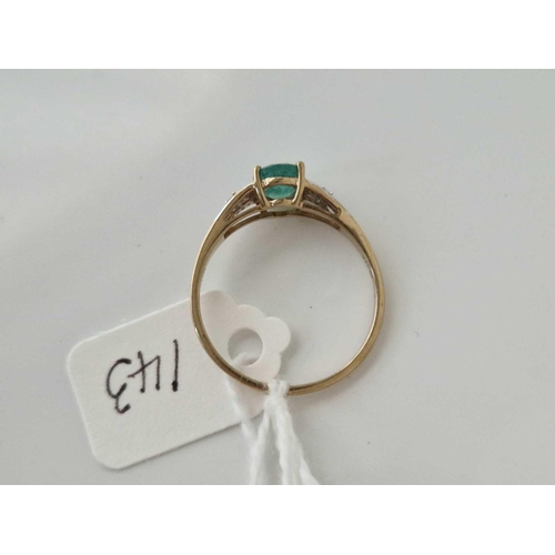 143 - A attractive emerald and diamond ring 10ct gold size S 2 gms