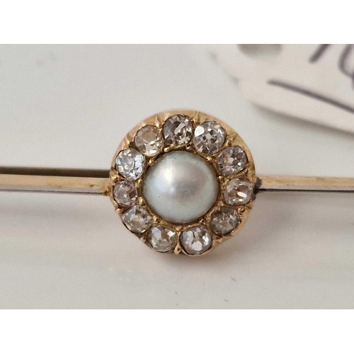 145 - A attractive pearl and diamond bar brooch set in gold 3.2 gms