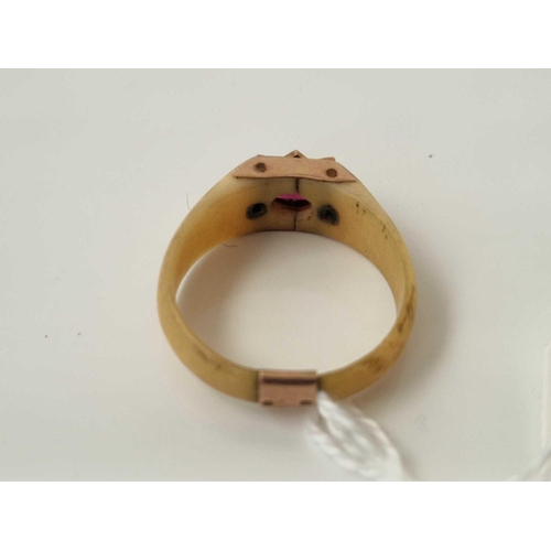 149 - A gold mounted bone red stone ring size U