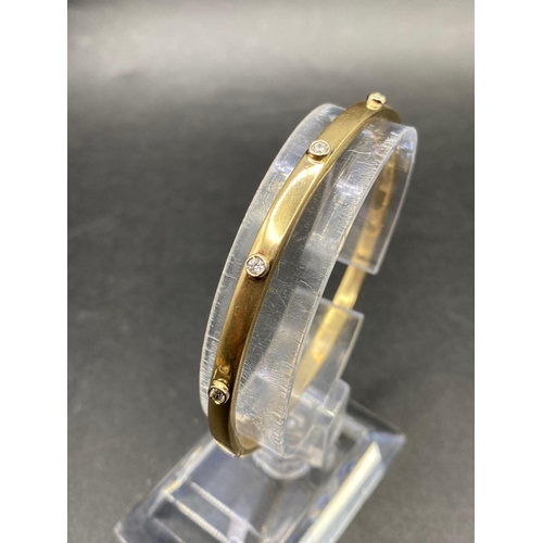 150 - Gold Bangle set with White Sapphires  7.1g  9ct