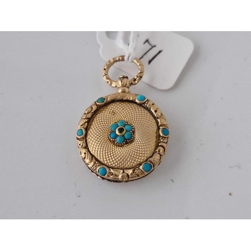 171 - A ANTIQUE GEORGIAN GOLD TESTED AND TURQUOISE FANCY LOCKET