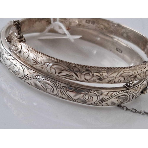 179 - Two silver hollow chased bangles