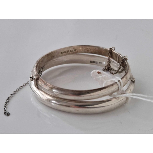 179 - Two silver hollow chased bangles