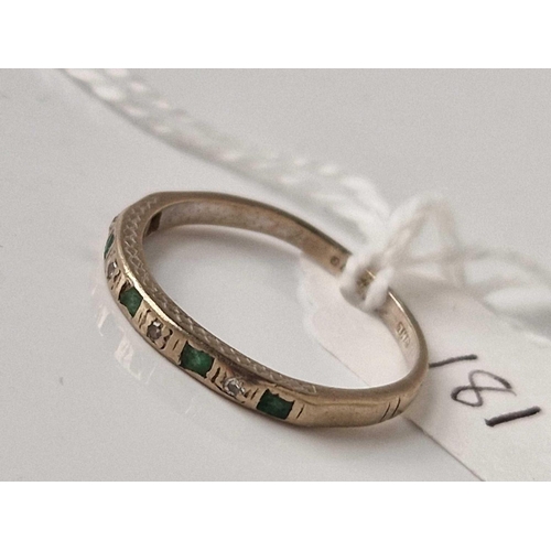 181 - A white gold emerald and diamond half hoop ring 18ct gold size O 2.2 gms