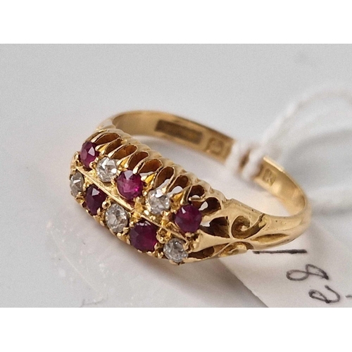 185 - A RUBY AND DIAMOND DOUBLE ROW RING 18CT GOLD