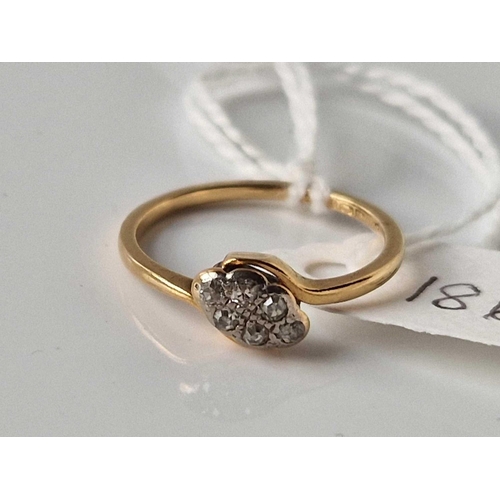 186 - A small diamond cluster ring 18ct gold size L 2 gms