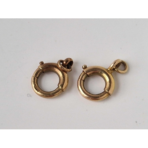 195 - A pair of bolt ring clasps 9ct