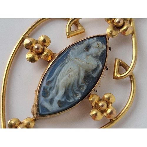 199 - A fancy gold set pendant with stone cameo 2 gms