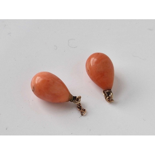 21 - A pair of antique coral drop earrings