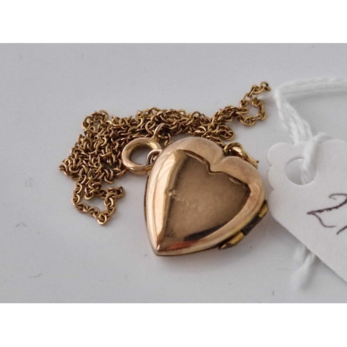 210 - A 18ct gold back and front locket on 9ct neck chain 16 inch 4.2 gms