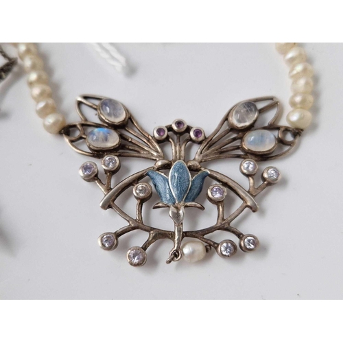 243 - A attractive silver and seed pearl moon stone butterfly necklace together with a silver and marcasit... 