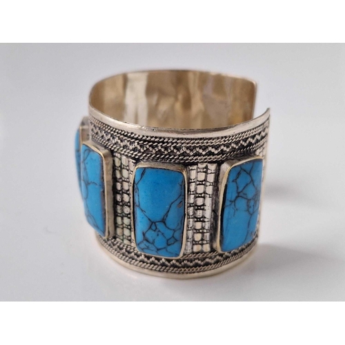 245 - A large wide vintage silver cuff bangle set with turquoise