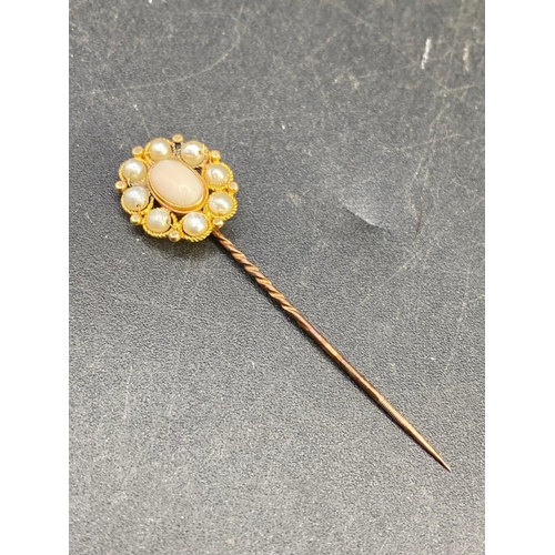 249 - A antique coral and real pearl large cluster stick pin in high carat