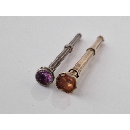 254 - A Victorian high carat gold pencil set with citrine and silver Victorian pencil with amethyst