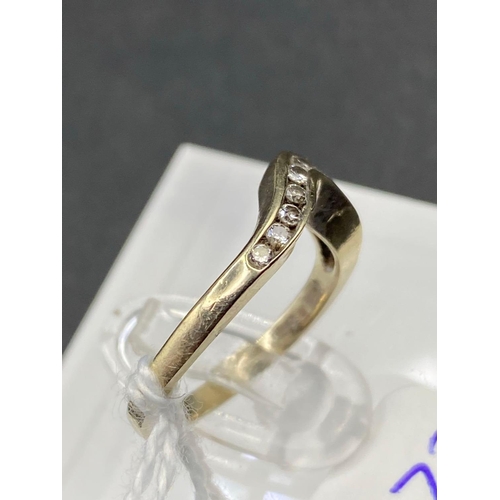 273 - A small diamond chevron ring 18ct gold size J 2.5g