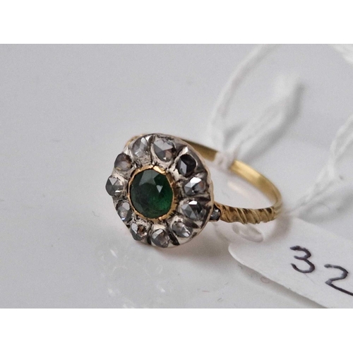 32 - Antique Georgian rose diamond and emerald ring with carved gold shank, with a glazed locket compartm... 