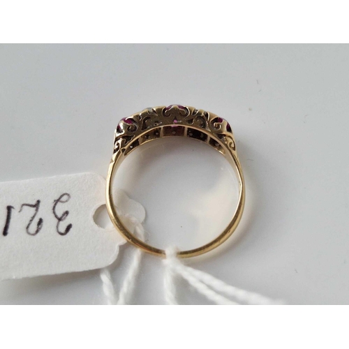 321 - A RUBY AND DIAMOND RING 18CT GOLD SIZE O 2.9 GMS