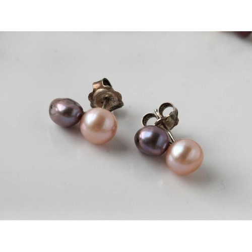 386 - A row of pearls and a pair of pearl earrings 36 inch